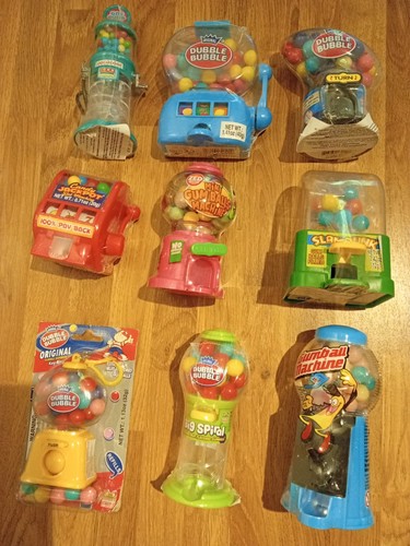 Nine gumball machine capsules - nine,